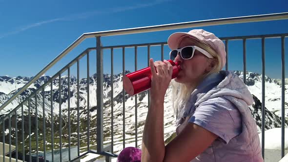 Woman Tourist Drinking Water Bottle