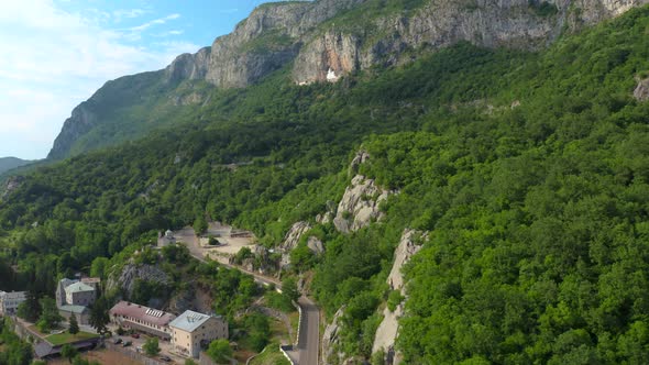 Aerial View on Ostrog Monastery in Rocky Montain is the Most Popular Pilgrimage Place in Montenegro