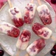 Fresh Cream and Cherry Homemade Popsicles Placed on White Ceramic Plate with Fruits and Textile - VideoHive Item for Sale