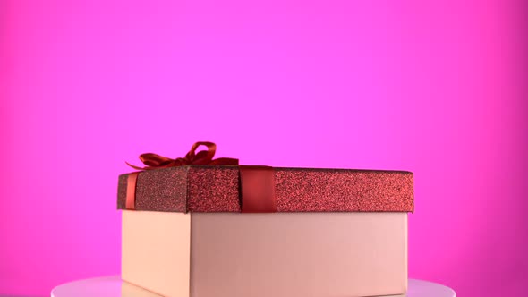 Present Box on Color Rainbow Background