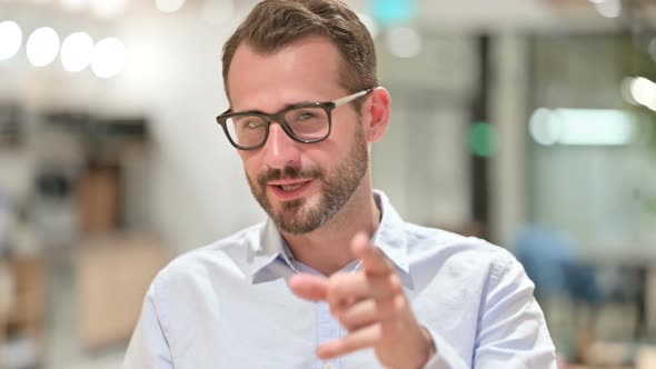 Portrait of Businessman Doing Video Chat