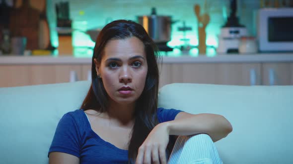 Woman Watching Television Very Concentrated