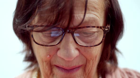 Elderly Woman Portrait Holding Cellphone. Mature Woman Face Close Up Reflection Screen On Mobile.