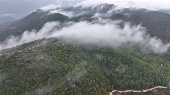 Clouds High in the Mountains Aerial View 4 K