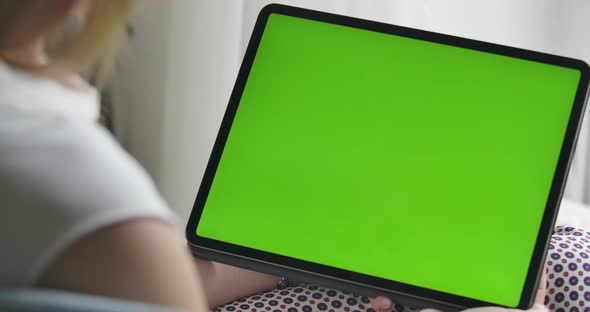 Unrecognizable Caucasian Woman Holding Tablet with Green Screen