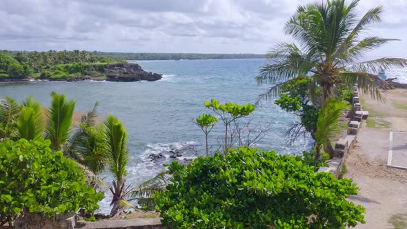 Seascape Rising Drone View Over Clifftop of Boca De Yuma Rugged Coastline on a Windy Day, Dominican