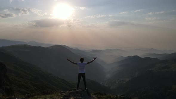 Man Watching Nature At Sunset