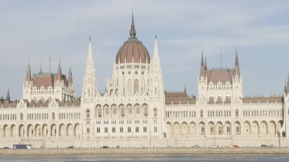 Hungarian parliament building located on river Danube  and city of Budapest by the day 4K 2160p Ultr