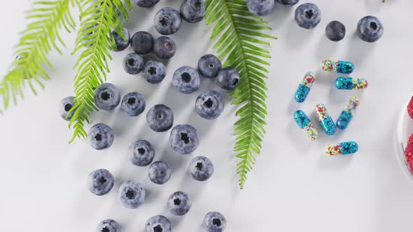 Fresh Berries And Capsule Pills alt