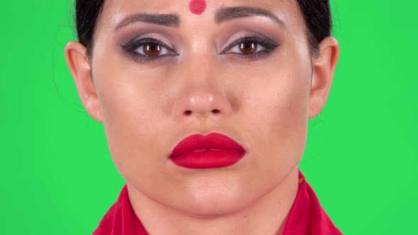 Portrait of Beautiful Indian Girl Is Looking at the Camera with Very Upset and Offended Face