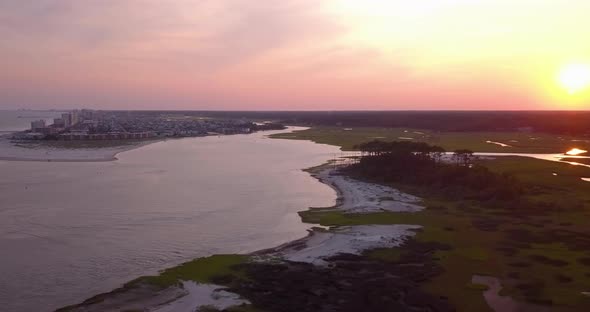 North Myrtle Beach at sunset with marsh and ocean inlet