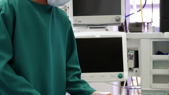 Surgeons interacting with the patient in operation room