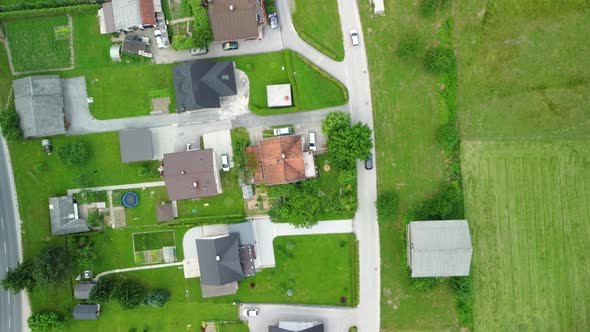 Drone view from family house in middle of settlement.