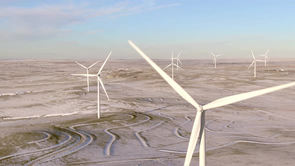 Aerial shots of wind turbines on a cold winter afternoon in Calhan, Colorado