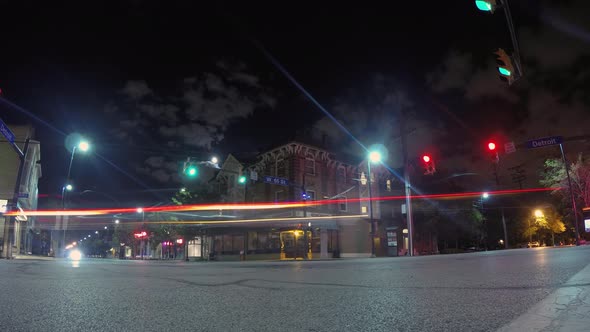 Timelapse of traffic on the street in Cleveland. Urban area with lots of cars, buses, pedestrians wa