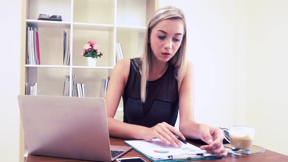 Blonde Business Woman Working at Modern Office