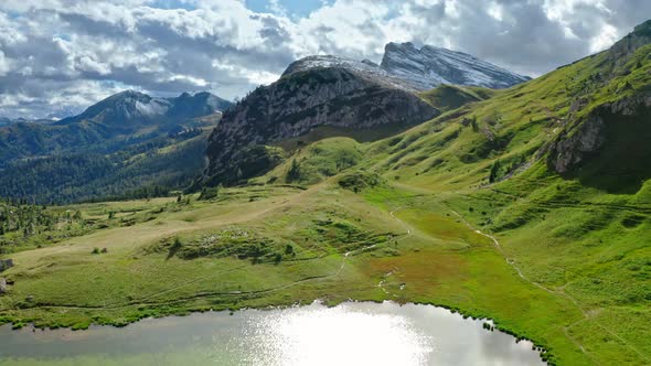 Passo Falazarego and lake in Dolomites, view from above