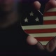 Female Hand Holding A USA Flag Badge. - VideoHive Item for Sale