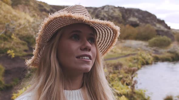 Woman Using Vintage Camera In Iceland