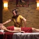 Thai massage in a cozy salon. Young woman on massage session - VideoHive Item for Sale