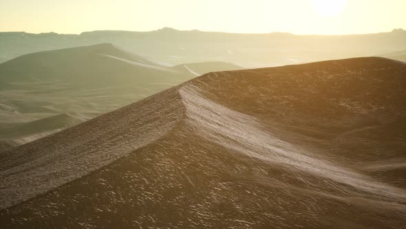 Aerial View on Big Sand Dunes in Sahara Desert at Sunrise