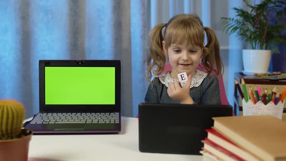 Child Girl Pupil Doing Homework with Teacher Using Digital Tablet at Home Laptop Green Screen