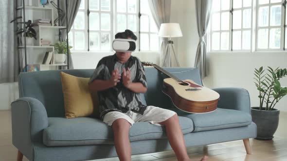 Close Up Asian Boy Explores Virtual Reality World