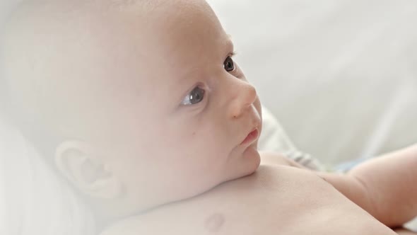 Baby Boy Looking Around alt