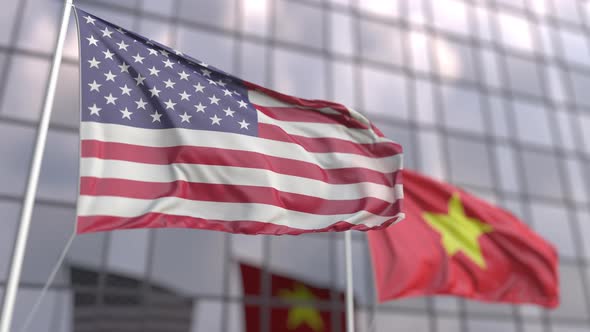 Waving Flags of the United States and Vietnam