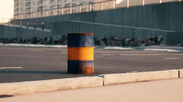 Old and Rusty Metal Barrel on Parking