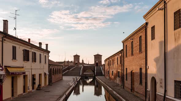 View of the symbol of Comacchio at dawn, the Trepponti bridge. Timelapse 4K