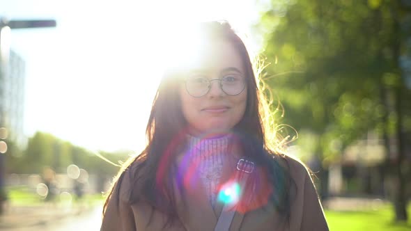 Slow Motion Happy Lovely University College Student Girl Wearing Geek Glasses Stylish Coat Smiling