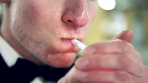 Close Up View of a Cigarette Being Lightened Toxic Inhaling