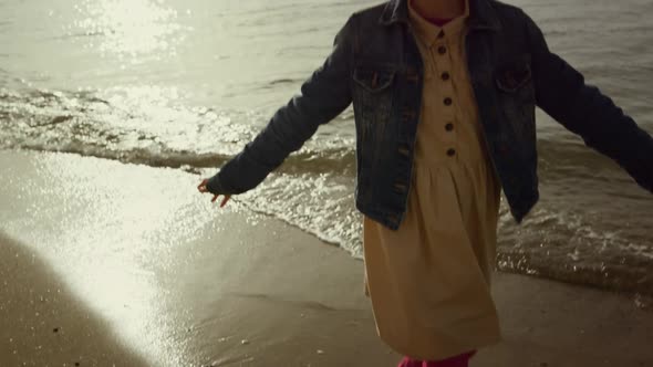 Young Girl Dancing Beach