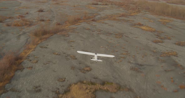 Gloomy helicopter aerial of industrial landscape in Alaska, drone