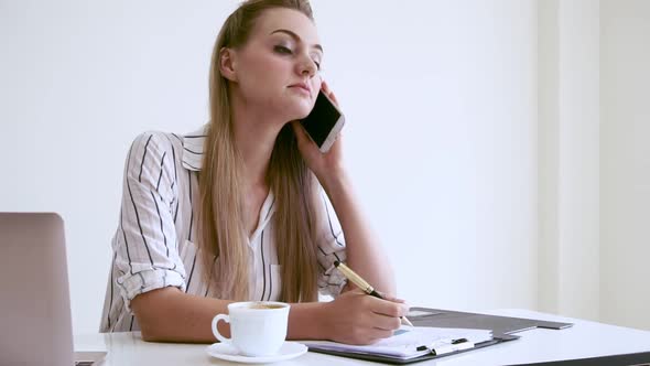 Blonde Business Woman Working at Modern Office