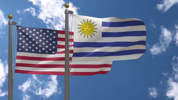 Usa Flag Vs Uruguay Flag On Flagpole