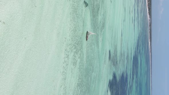 Tanzania Vertical Video  Boat Boats in the Ocean Near the Coast of Zanzibar Aerial View