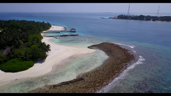 Aerial top view nature of paradise seashore beach time by blue green ocean and white sand background