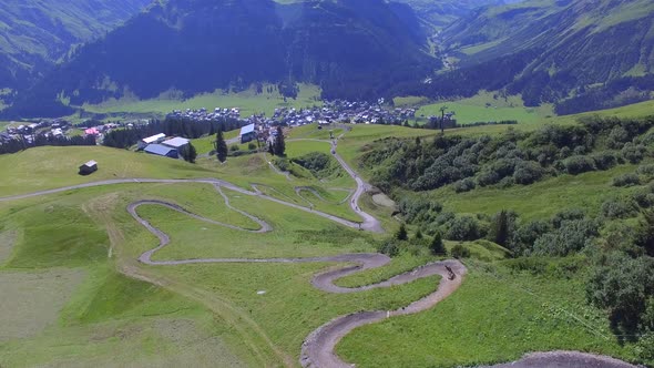 Aerial view of a mountain biker on a scenic singletrack trail