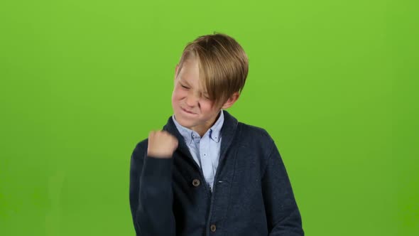 Child Rejoices in Victory. Green Screen