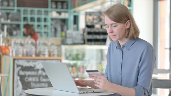 Online Shopping Payment Failure on Laptop By Young Woman