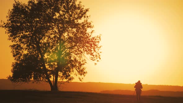 Silhouette Hiker Man Travelling Alone with Backpack. Travel Concept.