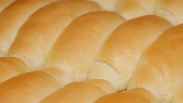 Fresh home baked crescent rolls just taken  from oven 4K 2160p UHD panning  video - Tasty dough cres