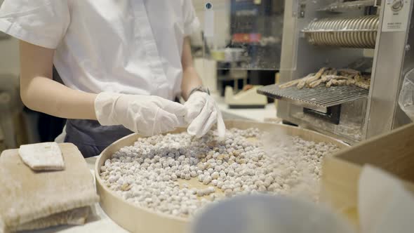 Female Hands In Gloves Preparing Tapioca Balls In A Milk Tea Cafe In Bangkok Thailand