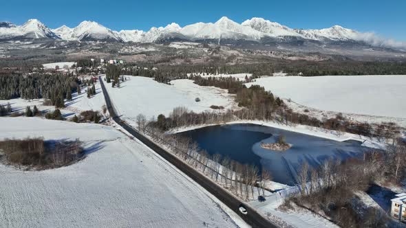 Aerial view of the pond in Strba and the High Tatras in Slovakia