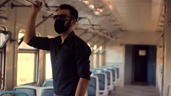 Businessman In Face Mask Protection Epidemic Coronavirus On Public Transport. Man Transport Train.