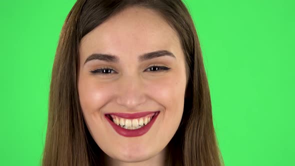 Cheery Female Bursting with Laughter Being in Positive Over Green Screen