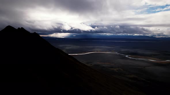 Drone Over Mountain Landscape With River Of Iceland