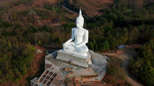 Wat Phrathat Pu Jae Buddha and Huai Mae Toek Lake in Phrae Province Thailand